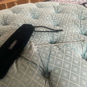 Silver plate candle snuffer.  New in gift pouch